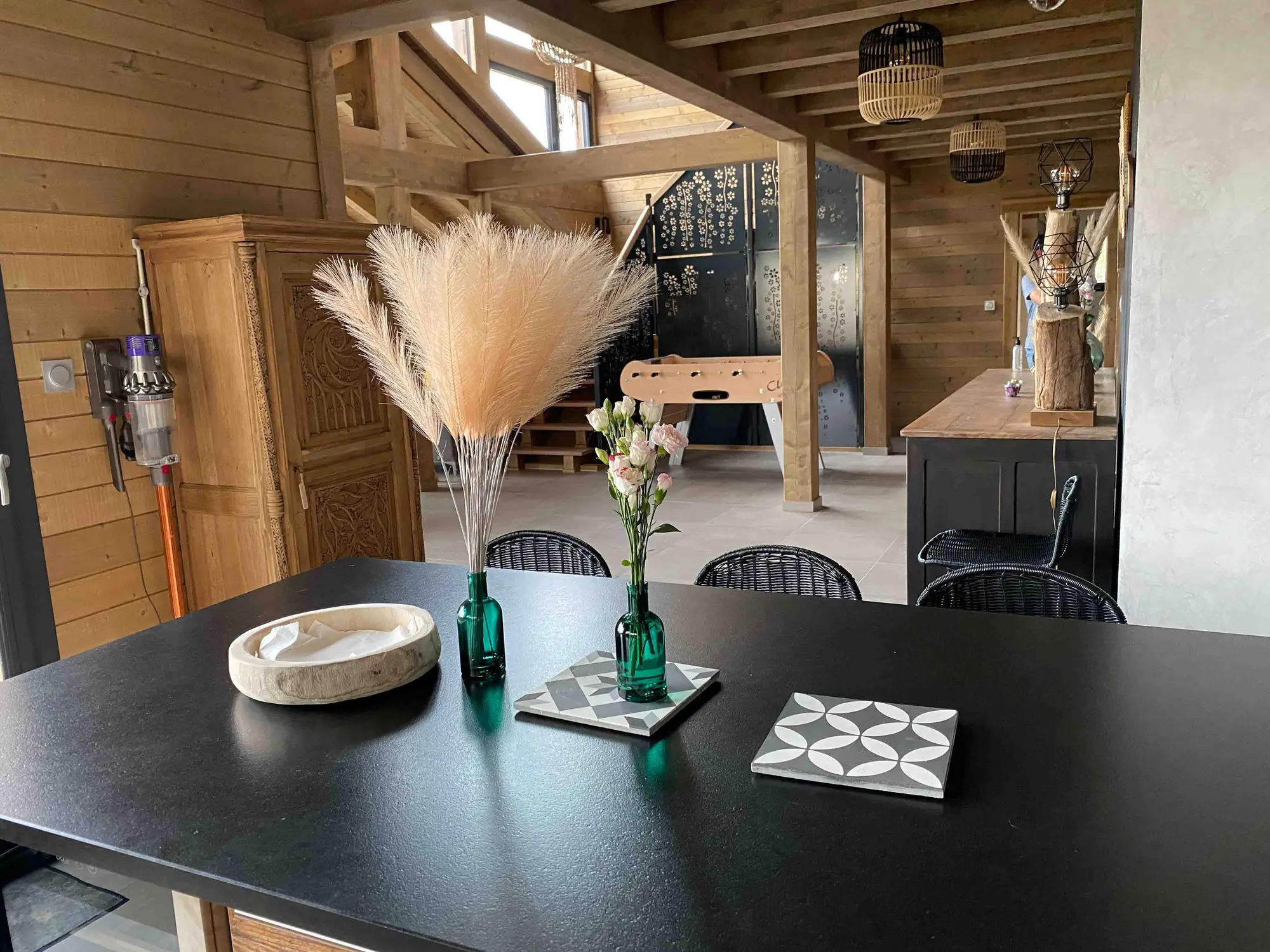The chalet's open kitchen with central island and valley view