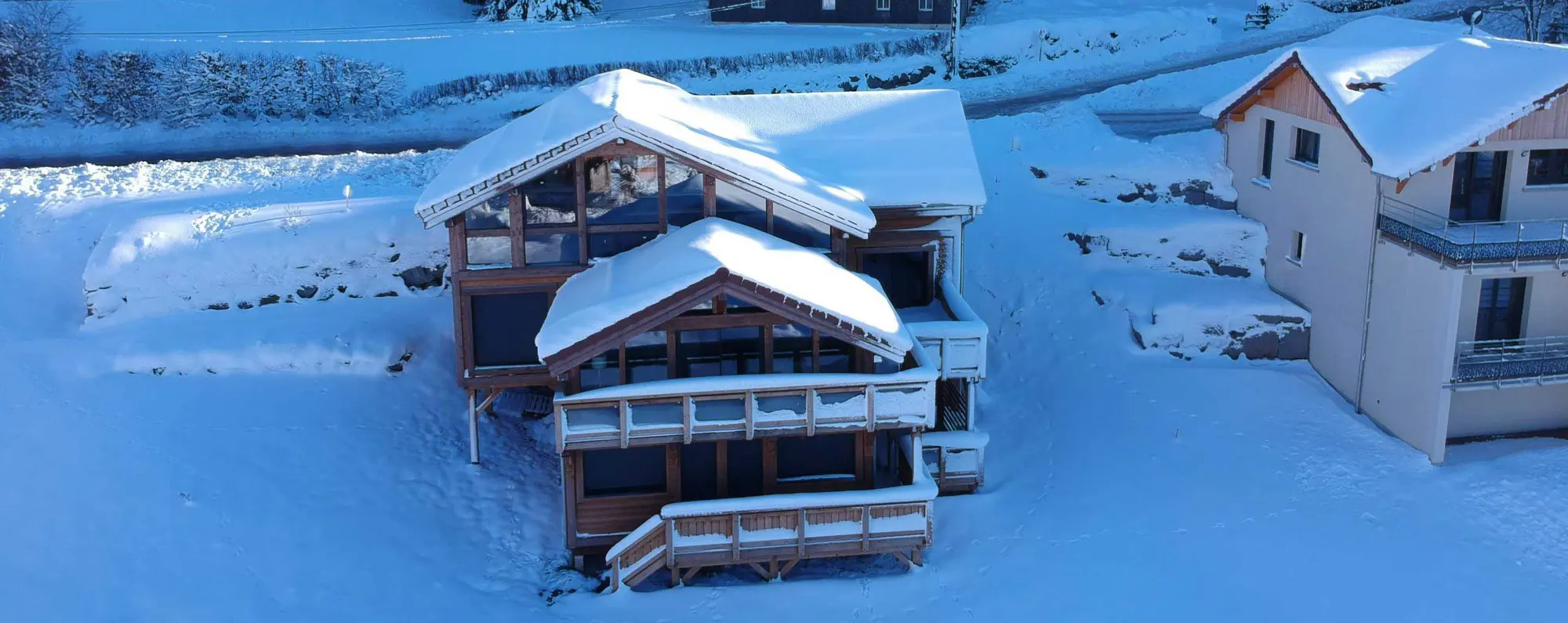 Aerial view of the chalet under snow in Gérardmer