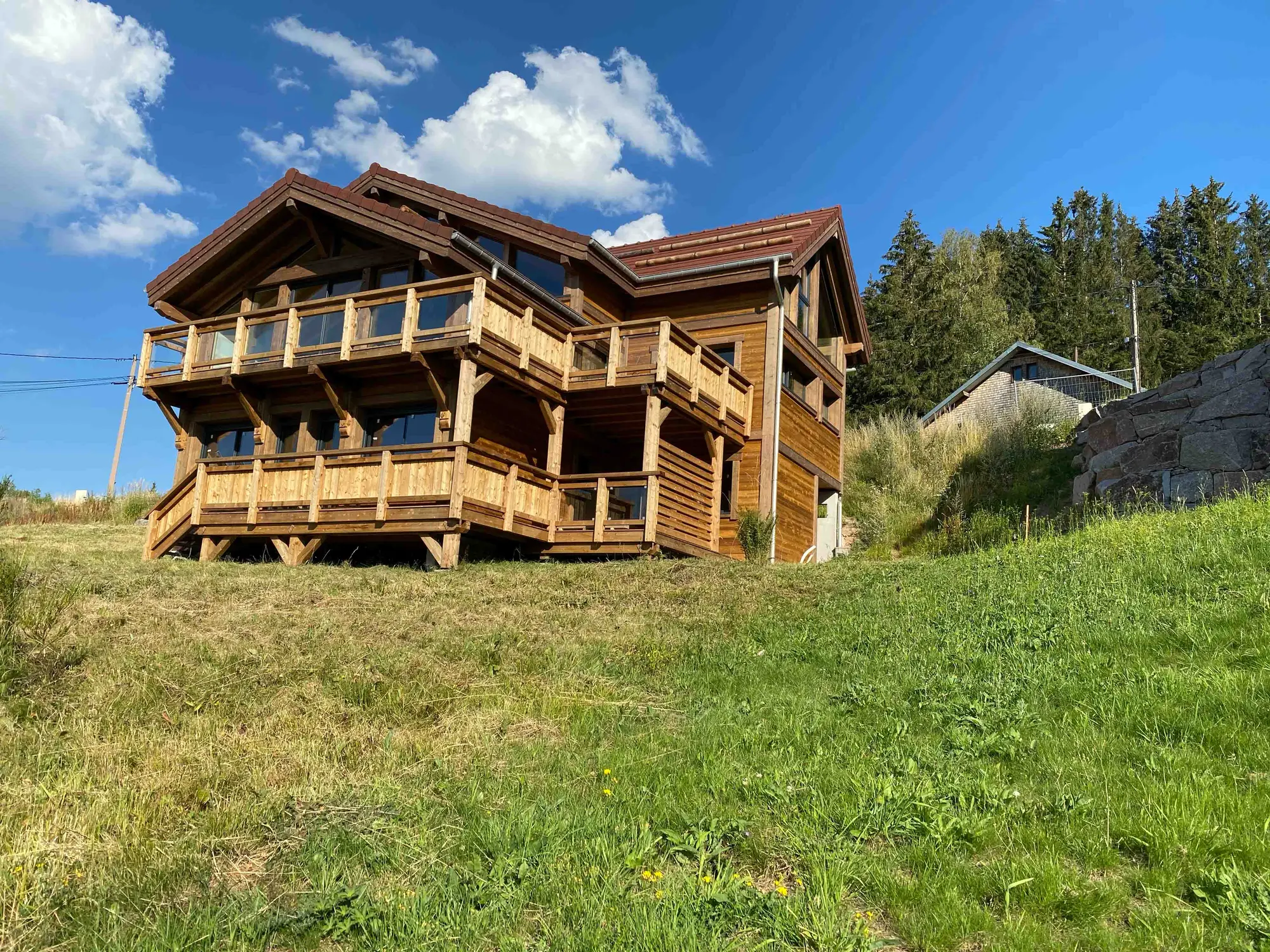 Le Flocon du Lac chalet in summer, on the heights above Gérardmer