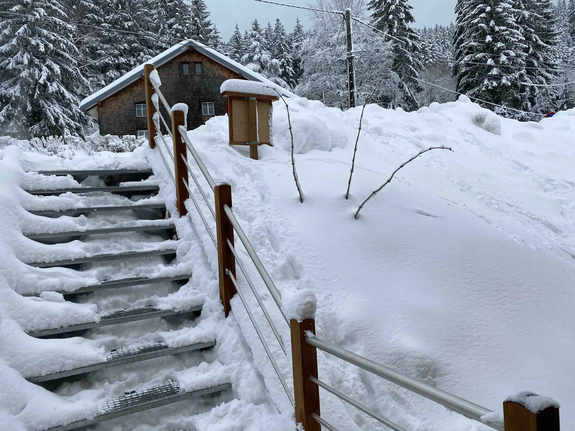 Snow-covered access to the chalet in winter